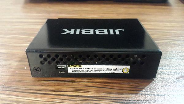 Finished JIBBIK device in its black metal enclosure