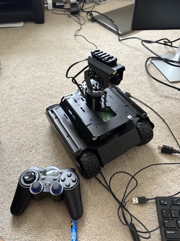 Jump-starter battery pack mounted next to the camera gimbal for untethered field power