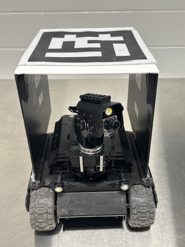 Front view of the rover with the pan/tilt camera gimbal and top-mounted AprilTag
