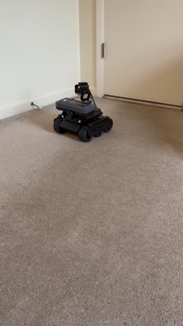 Early rover prototype on the floor, testing scale and drive